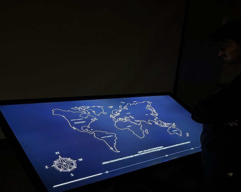 The world map screen on the kiosk